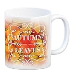 Kaffeebecher mit schönen Herbstblättern und Schriftzug - Autumn Leaves eine...